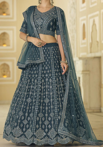Glossy catalogue: Rama blue mirror work lehenga