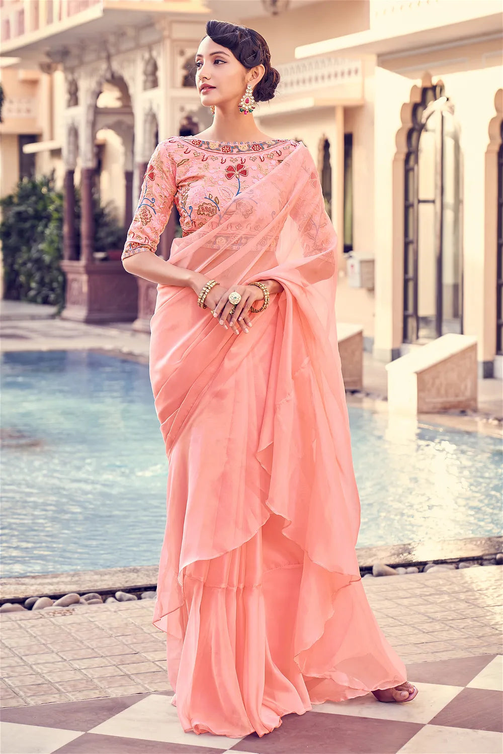 Peach ruffle plain saree in organza