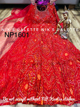 Niks collection - red bandhani gown with lots of flair