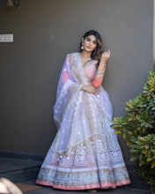 Bollywood inspired white and orange Lehenga