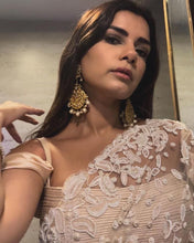 Celebrity inspired pearl and thread work saree