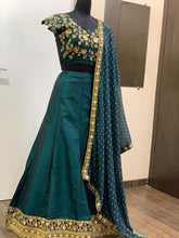 Emerald green and gold silk Lehenga