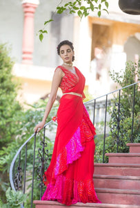 Partywear saree with a touch of bandhani printed ruffle