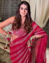 Red saree with sequins