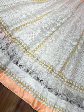 Bollywood inspired white and orange Lehenga