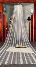 Off white net sequins embroidered saree