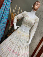 White and colourful threadwork Lehenga