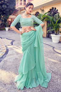 Mint green ruffle saree in organza