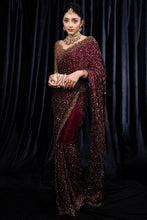 Magenta Kasturi silk sequinned saree