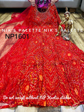 Niks collection - red bandhani gown with lots of flair