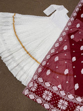 White embroidered gown