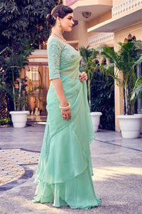 Mint green ruffle saree in organza