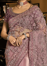 Swarovski designer saree collection: Peanut pink net saree