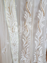 Luxury white lehenga with gold sequins