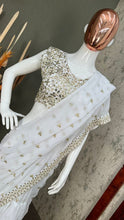 Hand embroidered ivory 3 layer ruffle saree