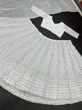 White beauty with sequins and mirror work