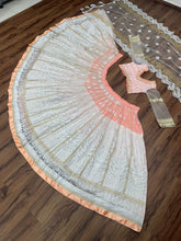 Bollywood inspired white and orange Lehenga