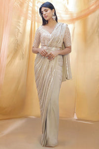 Celebrity style - ivory gold sequins saree