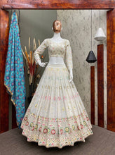 White and colourful threadwork Lehenga