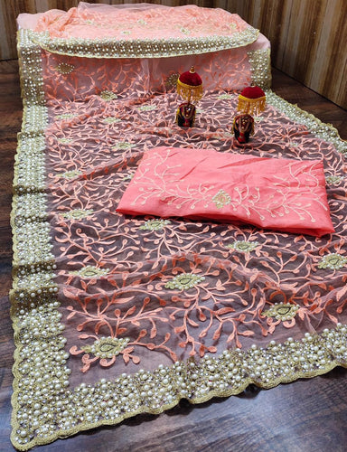 Pearl and stone work net sarees