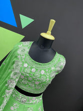 Chinnon silk green and white floral Lehenga