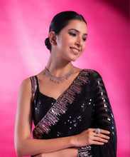 Celebrity style: black sequins saree