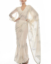 Celebrity inspired saree: white and silver sequinned saree