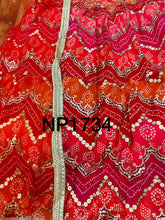 Niks collection - a gorgeous blend of red bandhani lehenga