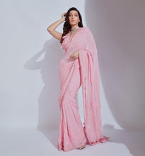 Celebrity inspired sequins light pink saree