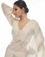 Celebrity inspired saree: white and silver sequinned saree