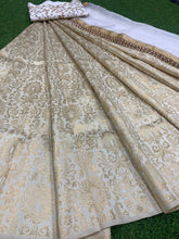 White and gold silk zari Lehenga