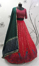Deep pink and green peacock Lehenga