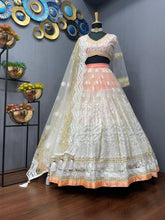 Bollywood inspired white and orange Lehenga