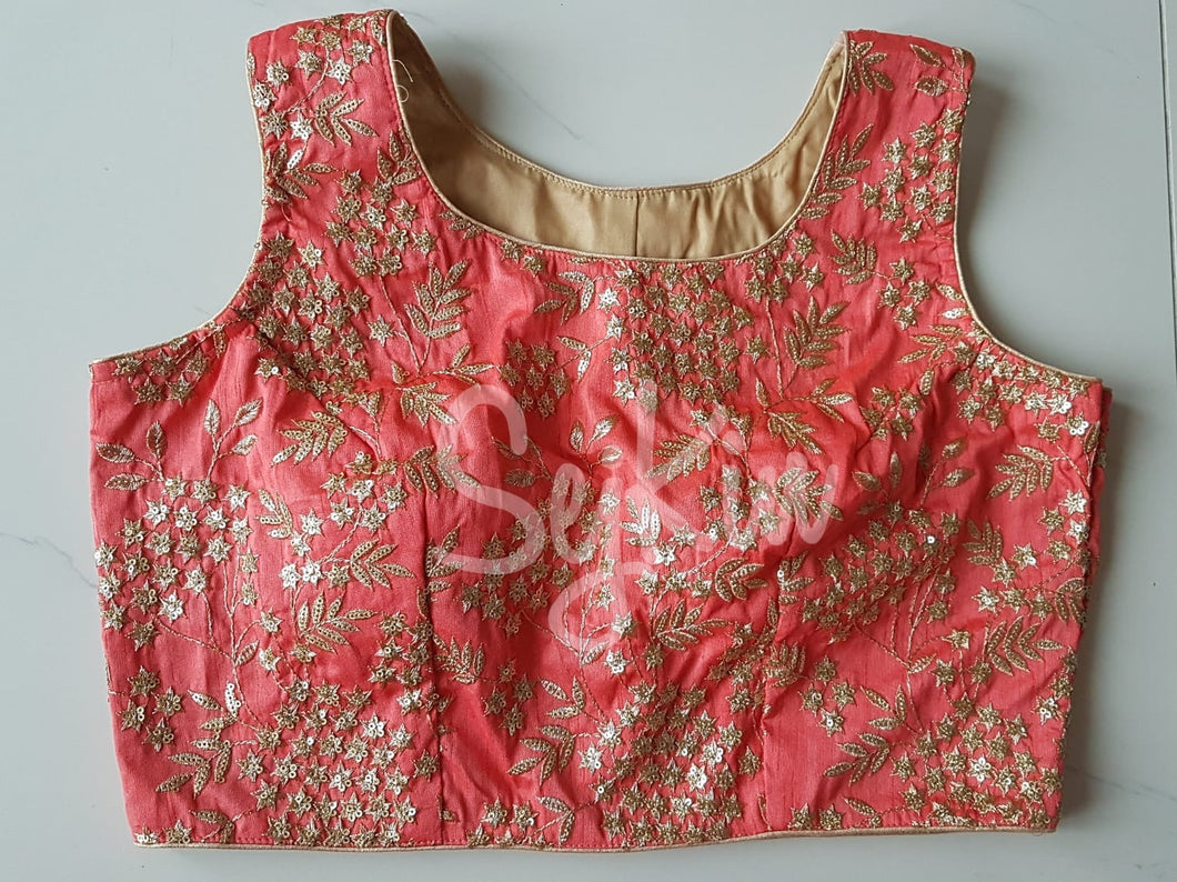 Peachy pink silk blouse with zari work