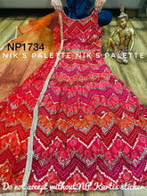 Niks collection - a gorgeous blend of red bandhani lehenga