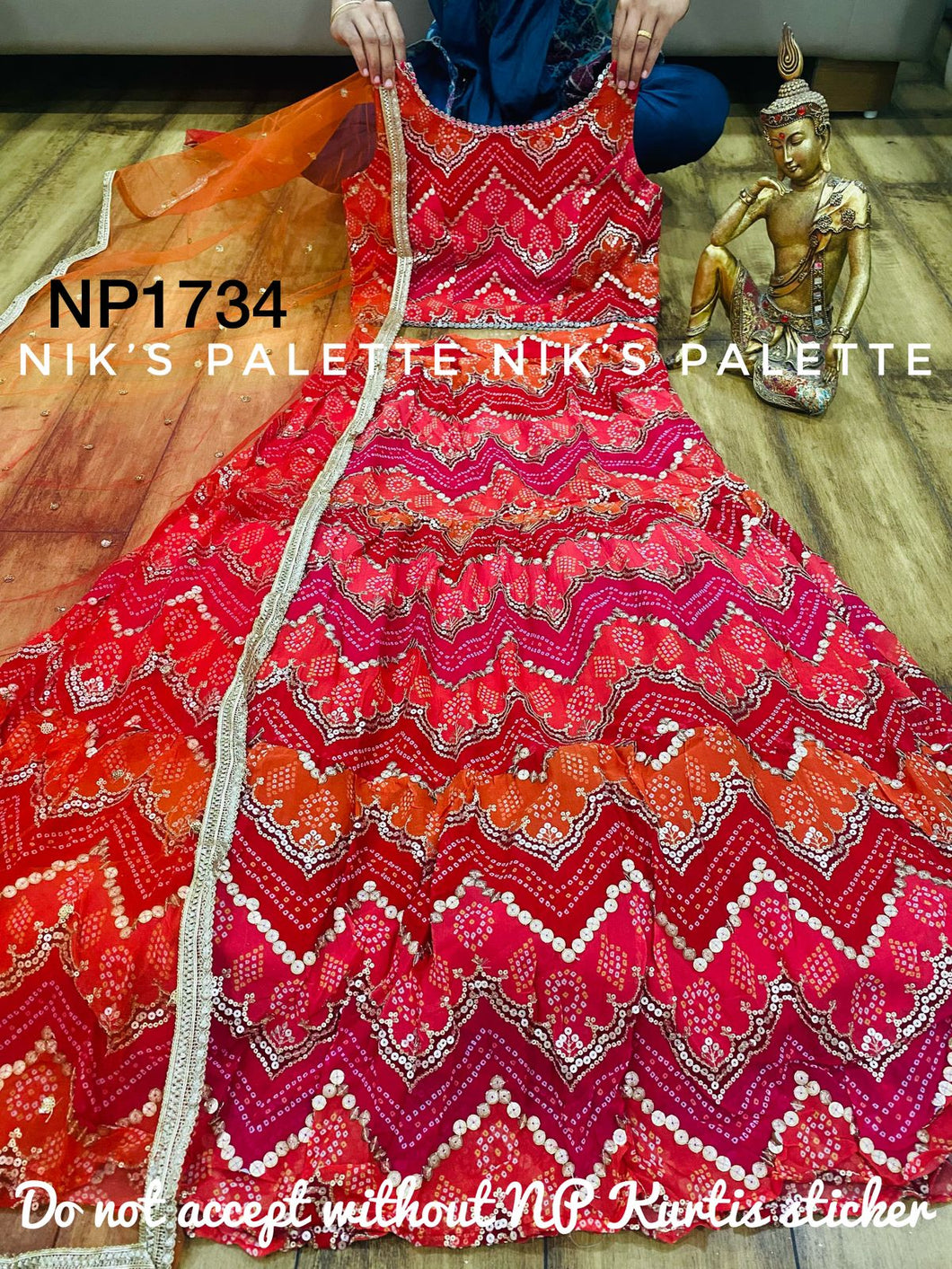 Niks collection - a gorgeous blend of red bandhani lehenga