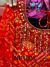 Niks collection - red bandhani gown with lots of flair